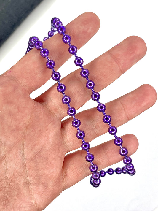 Collar de pelotitas