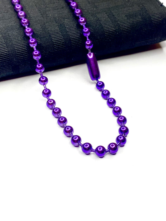 Collar de pelotitas