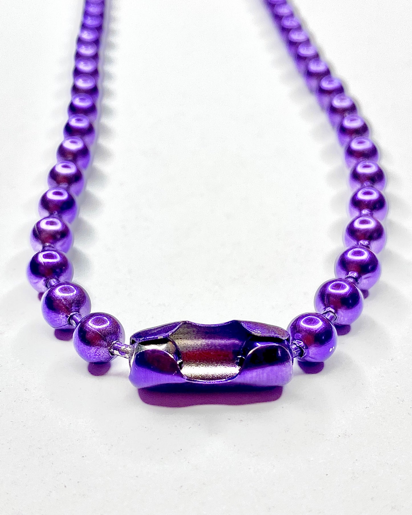 Collar de pelotitas
