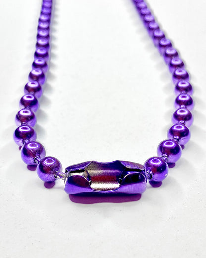 Collar de pelotitas